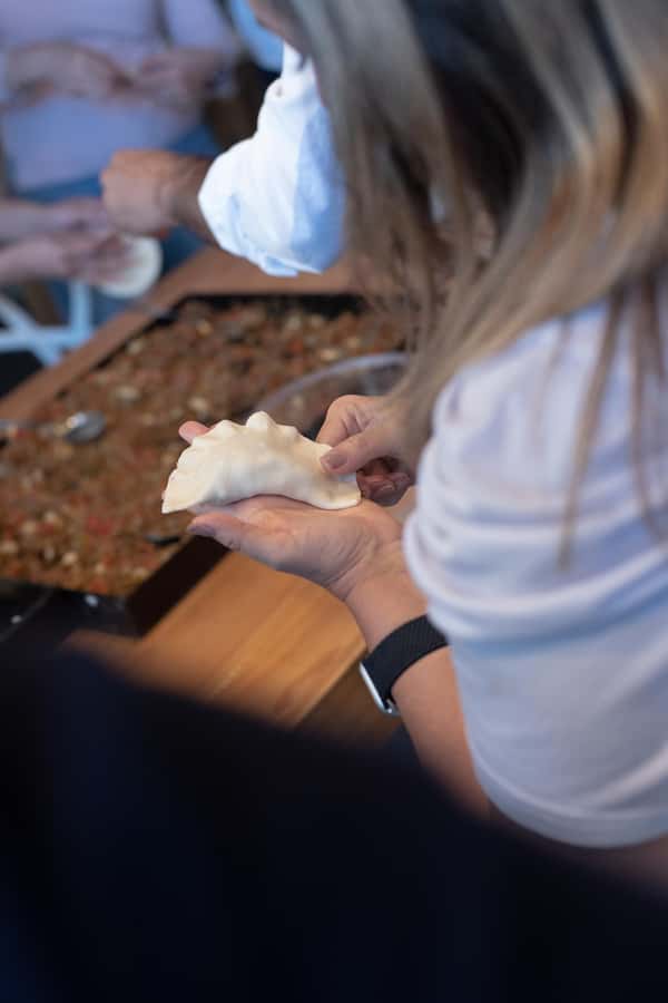 Premium Empanadas Cooking Class & Wine Tasting Experience - Palermo location and a 2-hour clock that keeps it fun